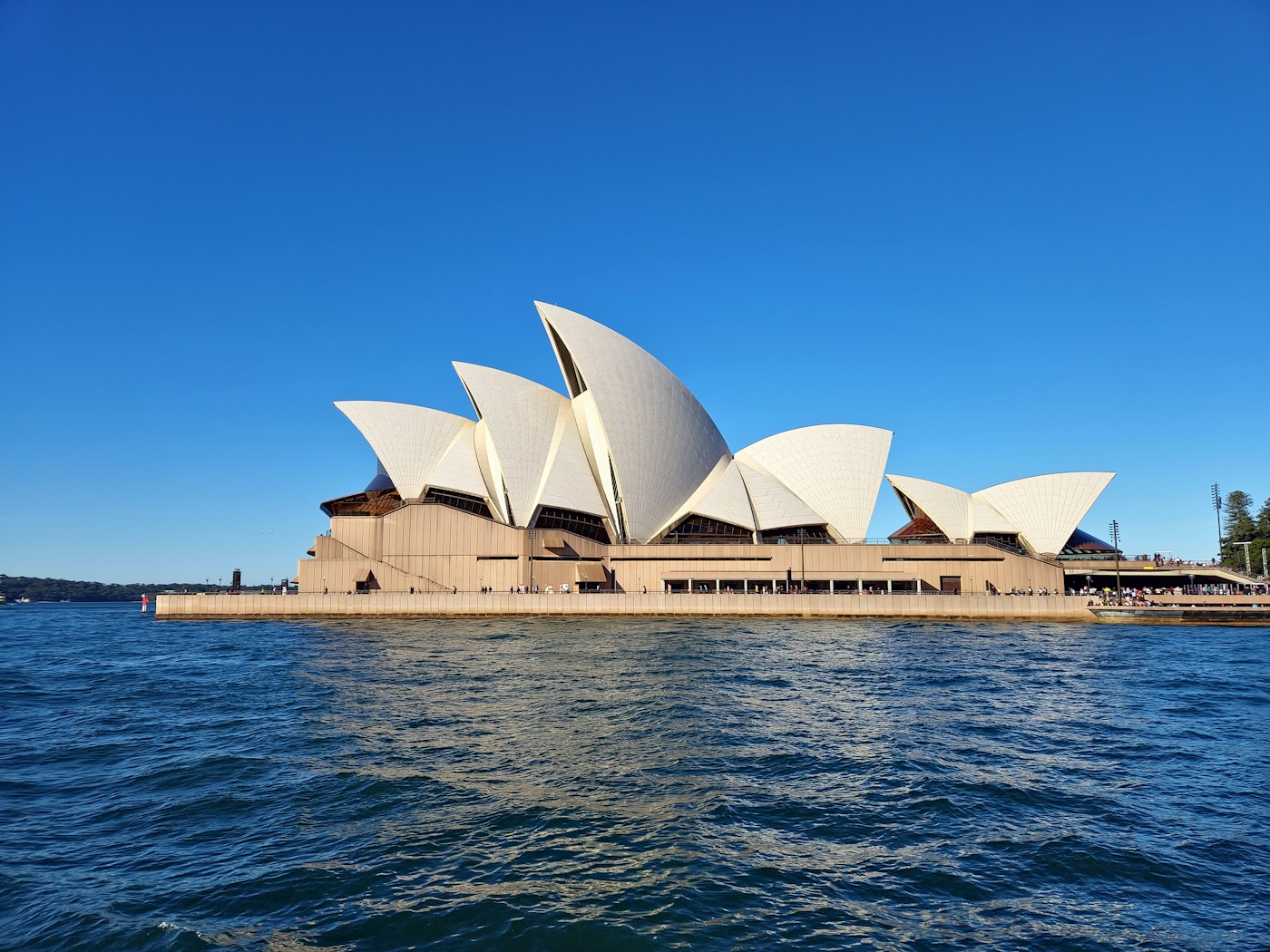 Sydney Opera House beside Sydney Harbour